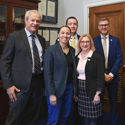 Jeanie and Shawnee leaders with US Rep. Sharice Davids